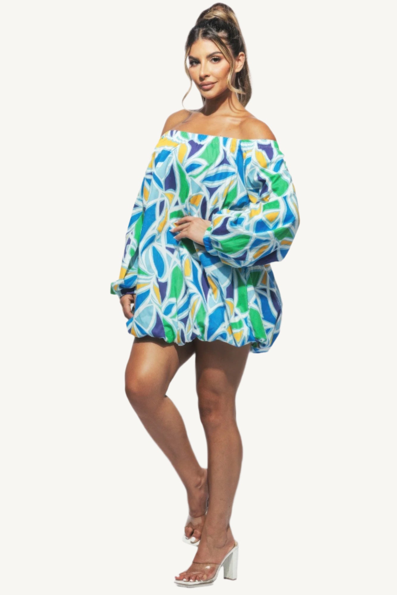 Chic off shoulder bubble mini dress crafted from high-quality fabric. A modern, playful yet elegant piece designed to turn heads at any event.