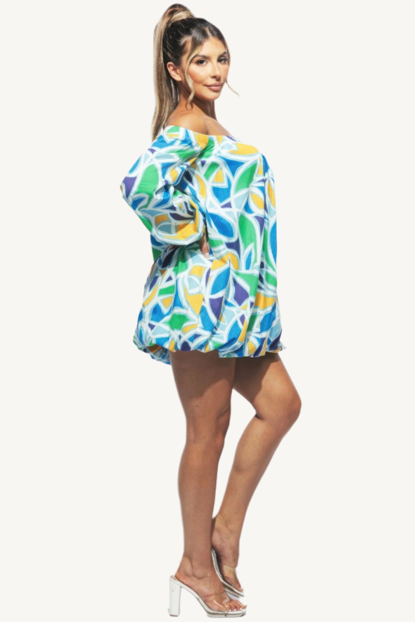 Chic off shoulder bubble mini dress crafted from high-quality fabric. A modern, playful yet elegant piece designed to turn heads at any event.