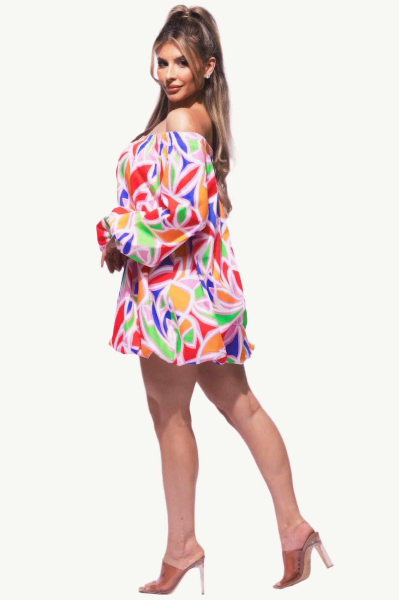 Off shoulder bubble mini dress with playful silhouette and elegant design. Made from a soft, comfortable fabric blend — perfect for statement looks.