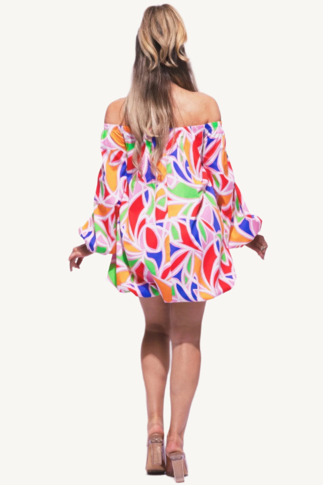 Off shoulder bubble mini dress with playful silhouette and elegant design. Made from a soft, comfortable fabric blend — perfect for statement looks.