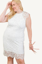 Lace crochet mini dress with raglan sleeves and zipper back. Elegant and feminine design perfect for semi-formal and stylish daytime occasions.