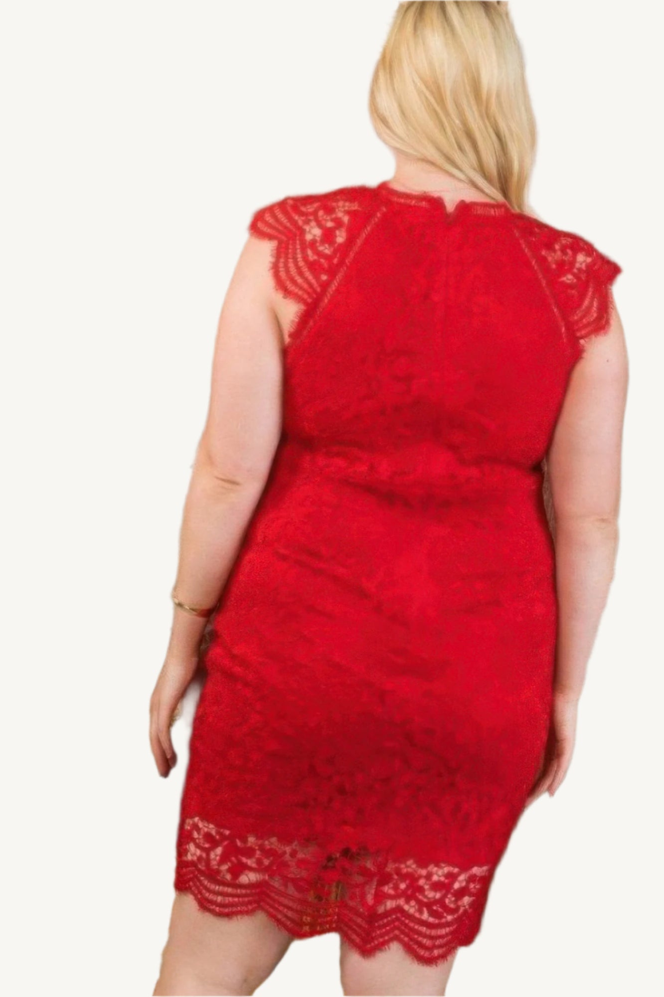 "Lace crochet mini dress with raglan sleeves and zipper back, designed for a stylish, elegant, and confident look."