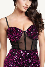 "Velvet corset maxi dress with contrast mesh detailing – elegant bustier-style silhouette for a bold, modern formal look."
