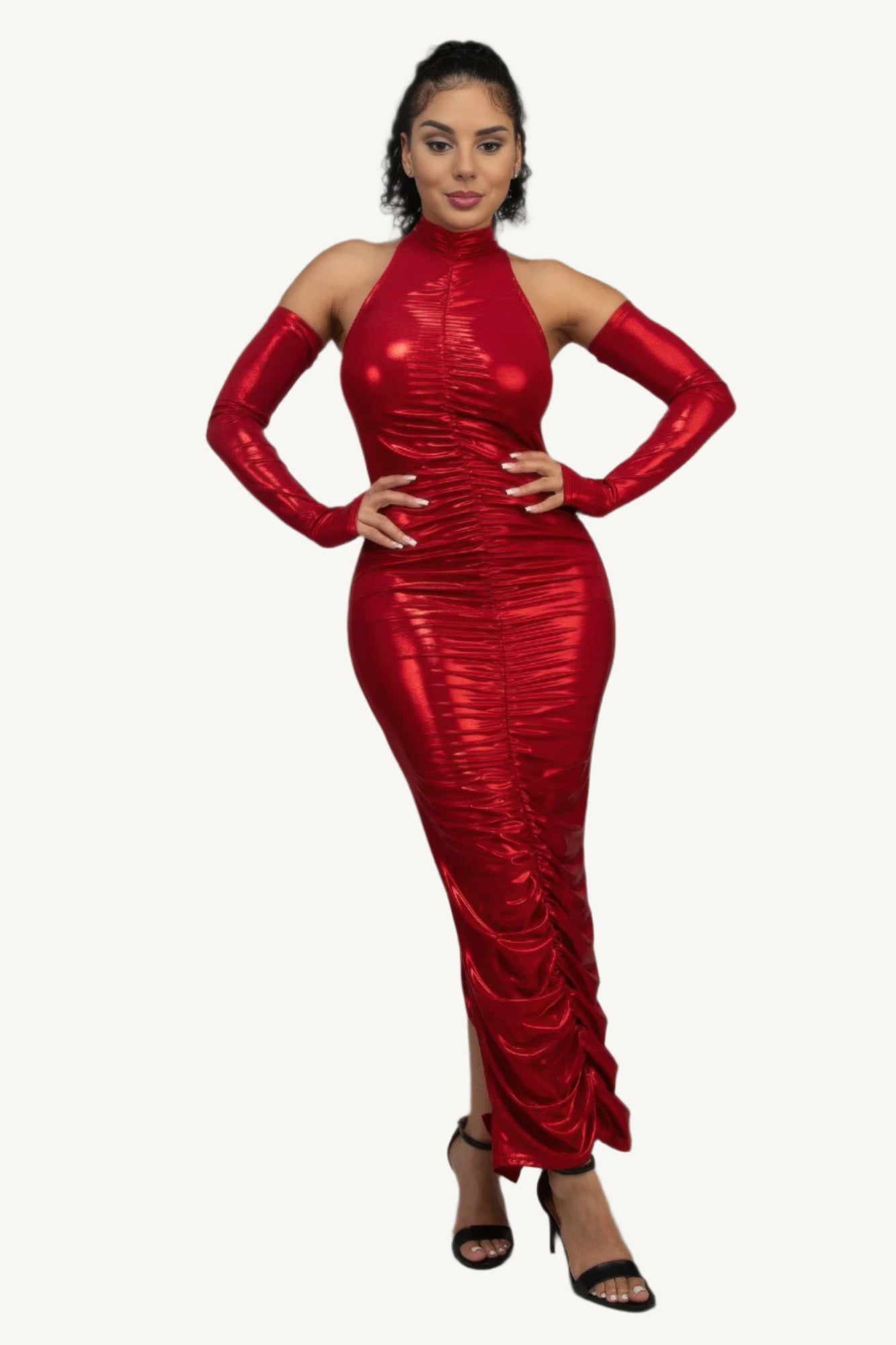 Red metallic ruched dress with sleeves, keyhole detail, invisible back zipper, and back slit – made in the USA.
