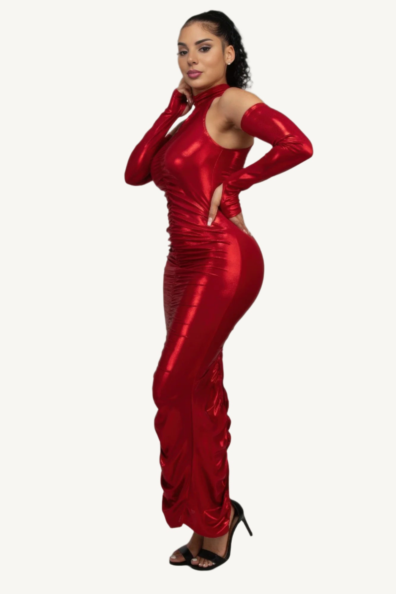 Red metallic ruched dress with sleeves, keyhole detail, invisible back zipper, and back slit – made in the USA.