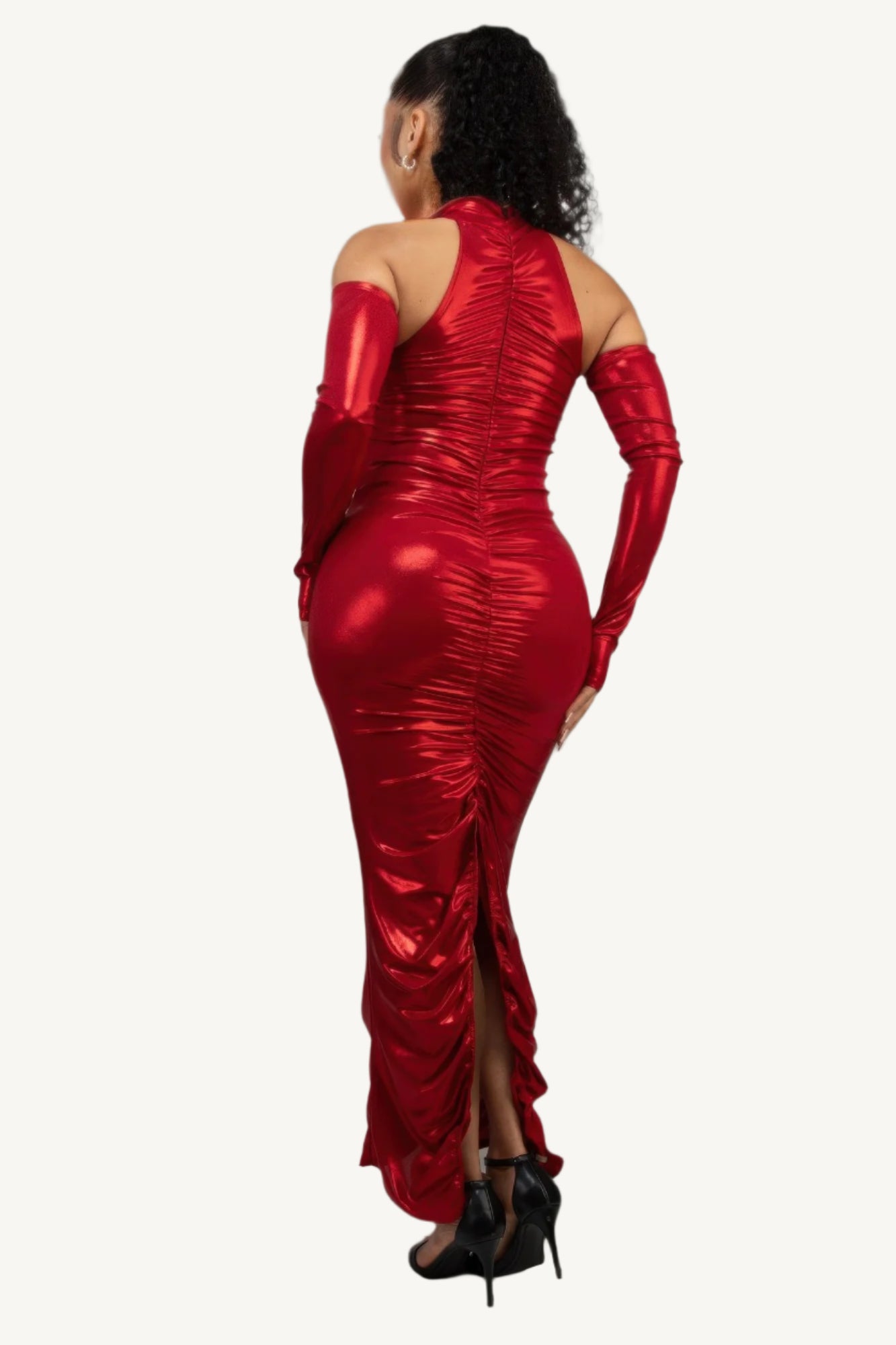 Red metallic ruched dress with sleeves, keyhole detail, invisible back zipper, and back slit – made in the USA.