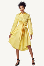 "Yellow shirt dress with tie-up belt – classic silhouette with a modern twist, combining comfort and sophistication."
