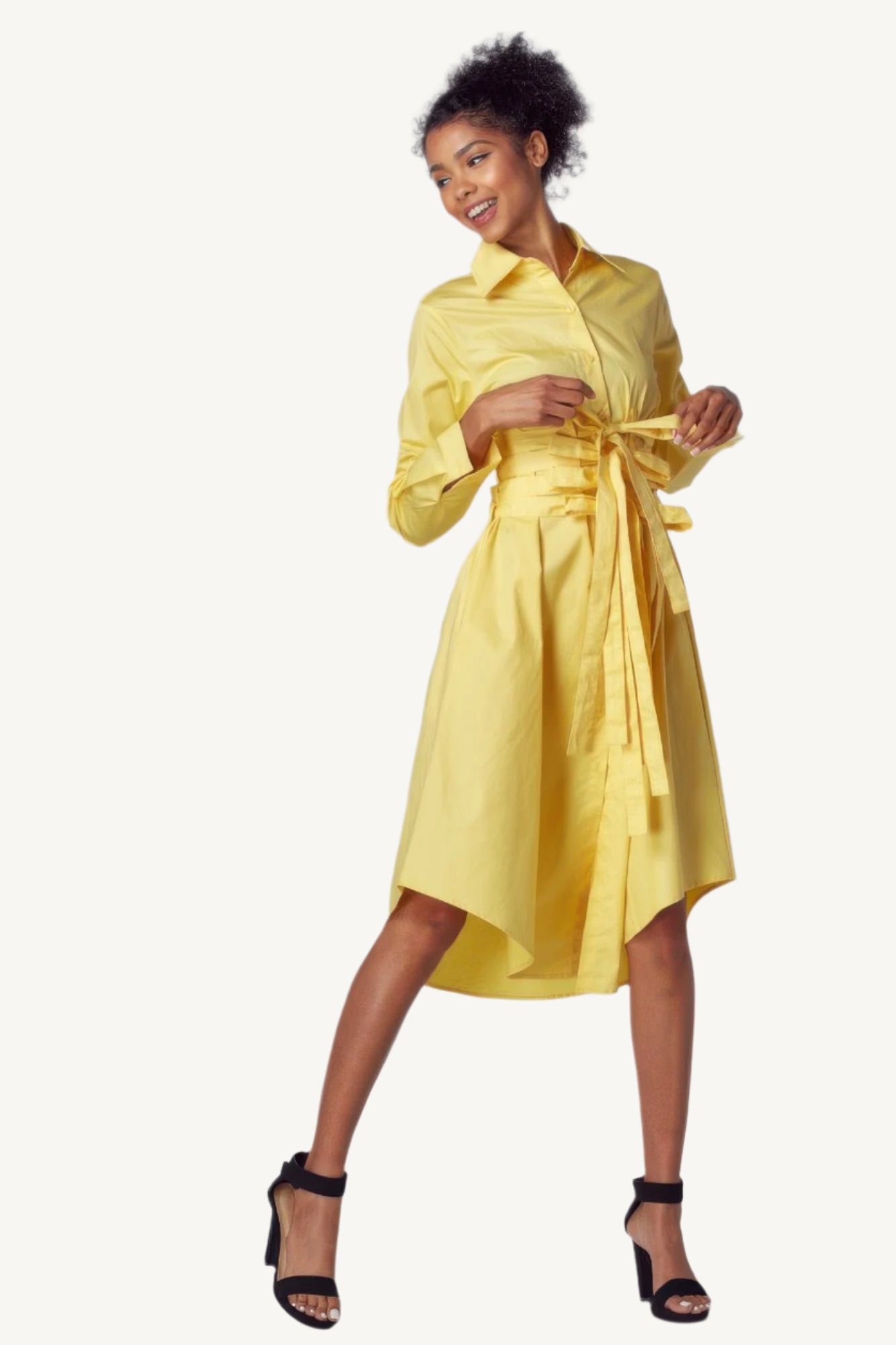 "Yellow shirt dress with tie-up belt – classic silhouette with a modern twist, combining comfort and sophistication."