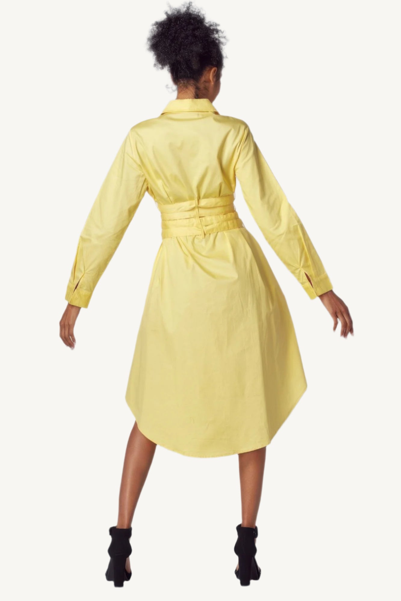 "Yellow shirt dress with tie-up belt – classic silhouette with a modern twist, combining comfort and sophistication."