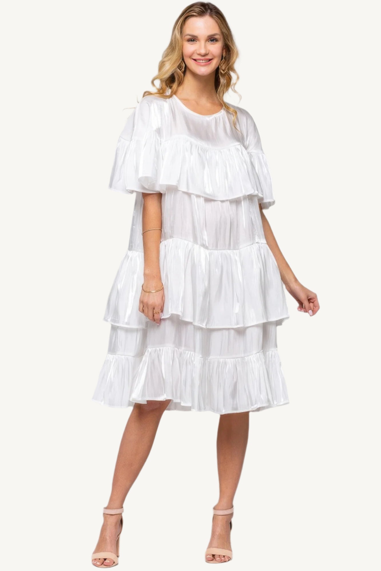 "White ruffle midi dress – elegant, shimmering fabric with a chic silhouette perfect for special occasions."