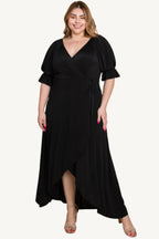 Plus-size solid color faux wrap maxi dress with Venezia fabric finish. Elegant silhouette offering style, comfort, and versatility for all occasions.