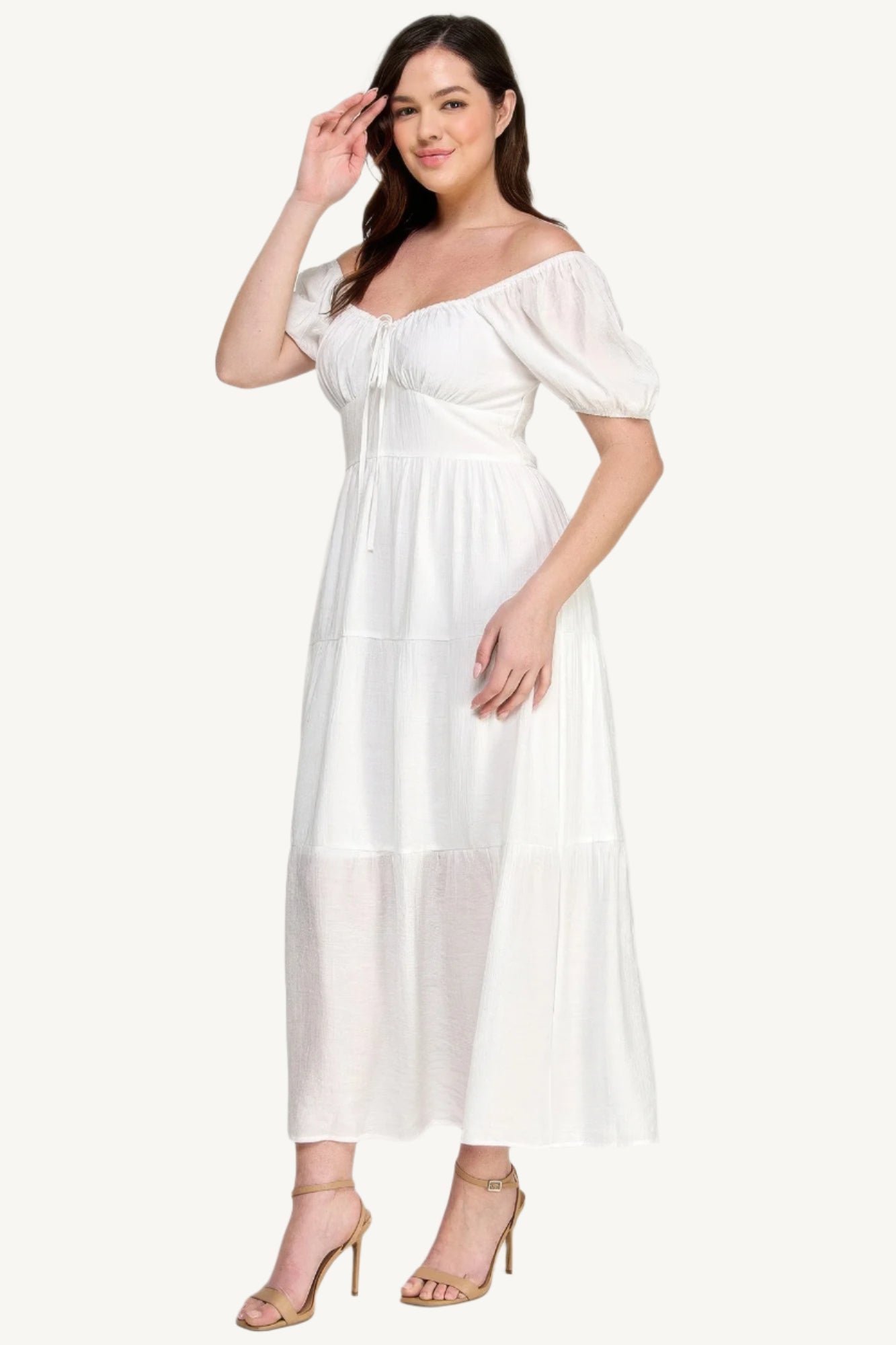 "White plus size tiered maxi dress with puff sleeves and front tie detail, crafted from lightweight polyester for a fresh and feminine look."