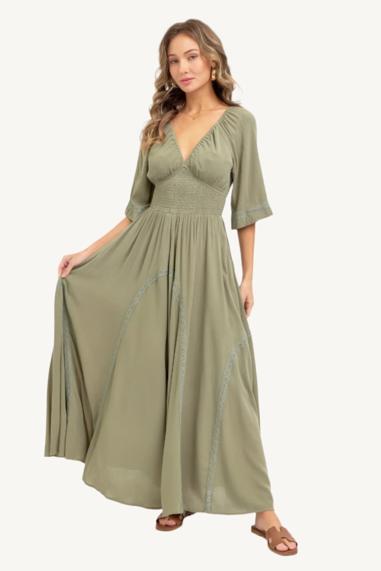 Romantic maxi dress made of lightweight rayon with a smocked bodice, V-neckline, lace-trimmed skirt, and breezy silhouette – feminine, flattering, and seasonless.