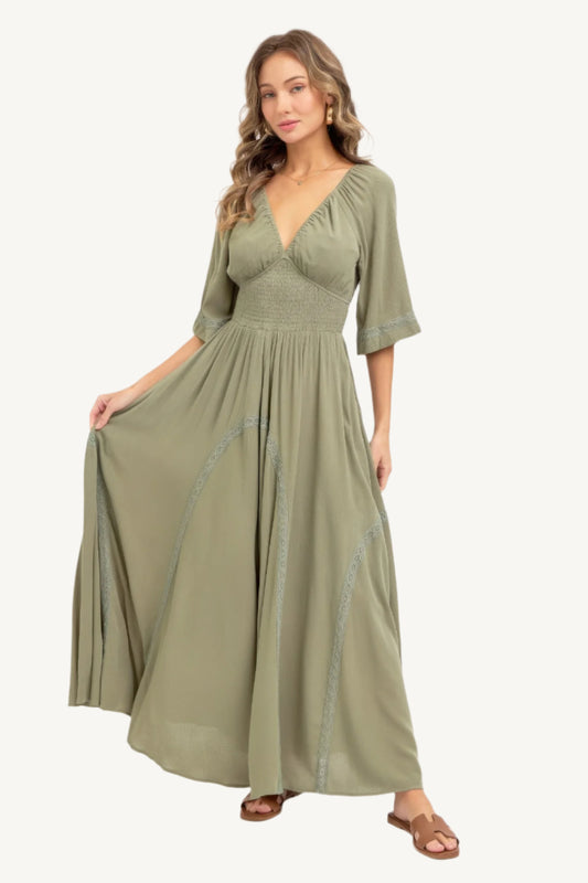 Romantic maxi dress made of lightweight rayon with a smocked bodice, V-neckline, lace-trimmed skirt, and breezy silhouette – feminine, flattering, and seasonless.