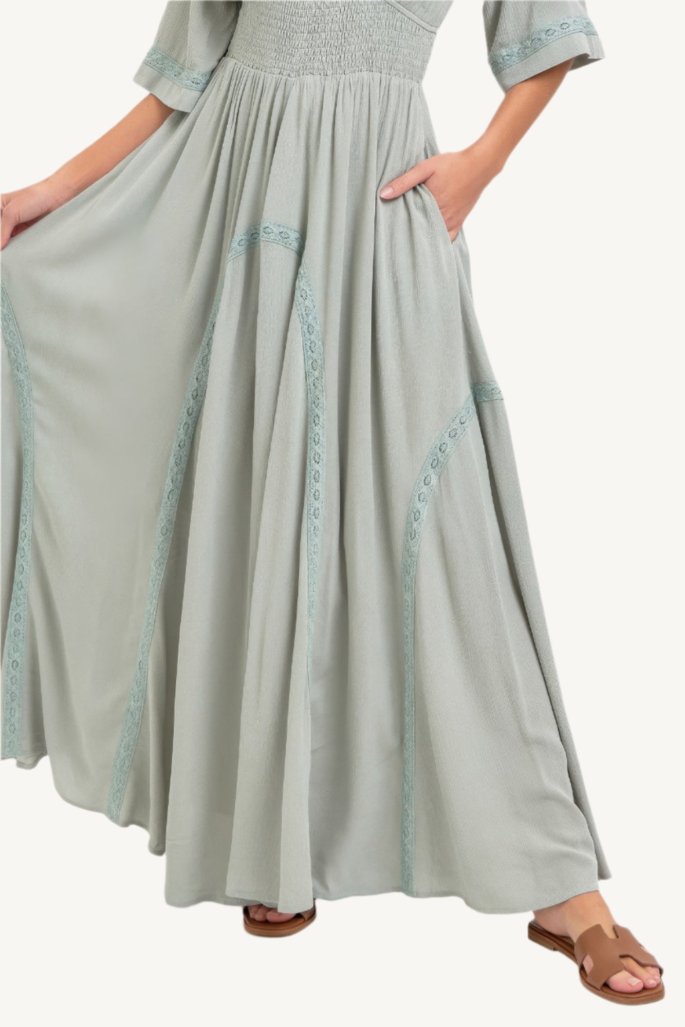 Flowy rayon maxi dress with smocked bodice, V-neckline, lace trim skirt, and breezy silhouette – romantic, feminine, and effortlessly elegant.