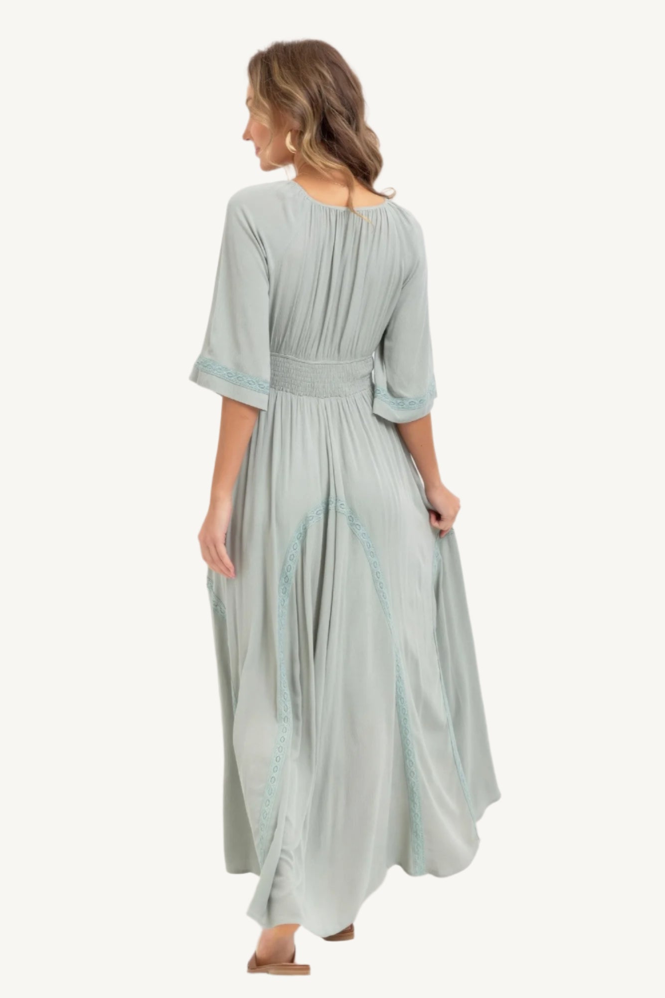 Flowy rayon maxi dress with smocked bodice, V-neckline, lace trim skirt, and breezy silhouette – romantic, feminine, and effortlessly elegant.