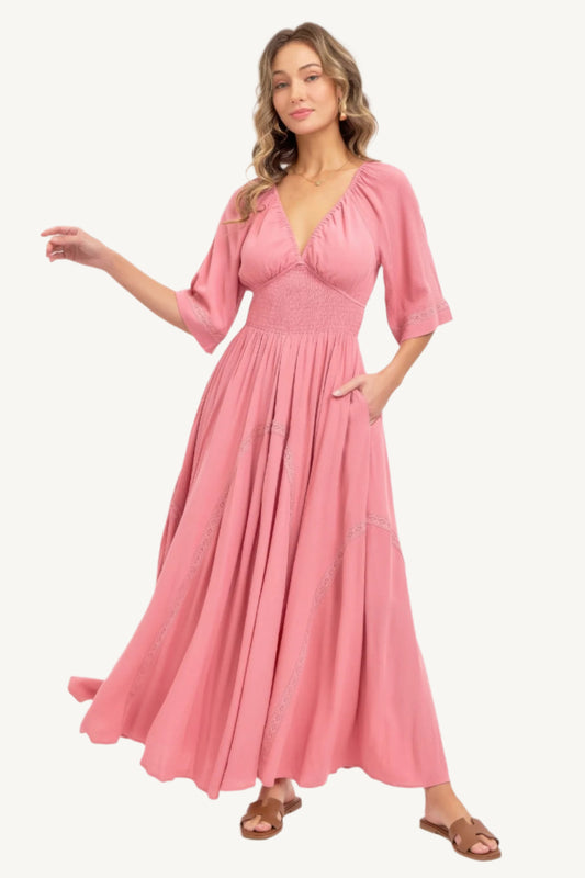 Romantic flowy maxi dress with smocked bodice, V-neckline, lace trim detailing, and soft rayon fabric – breezy, elegant, and perfect for day-to-night wear.