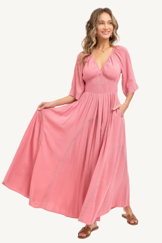 Romantic flowy maxi dress with smocked bodice, V-neckline, lace trim detailing, and soft rayon fabric – breezy, elegant, and perfect for day-to-night wear.