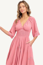 Romantic flowy maxi dress with smocked bodice, V-neckline, lace trim detailing, and soft rayon fabric – breezy, elegant, and perfect for day-to-night wear.