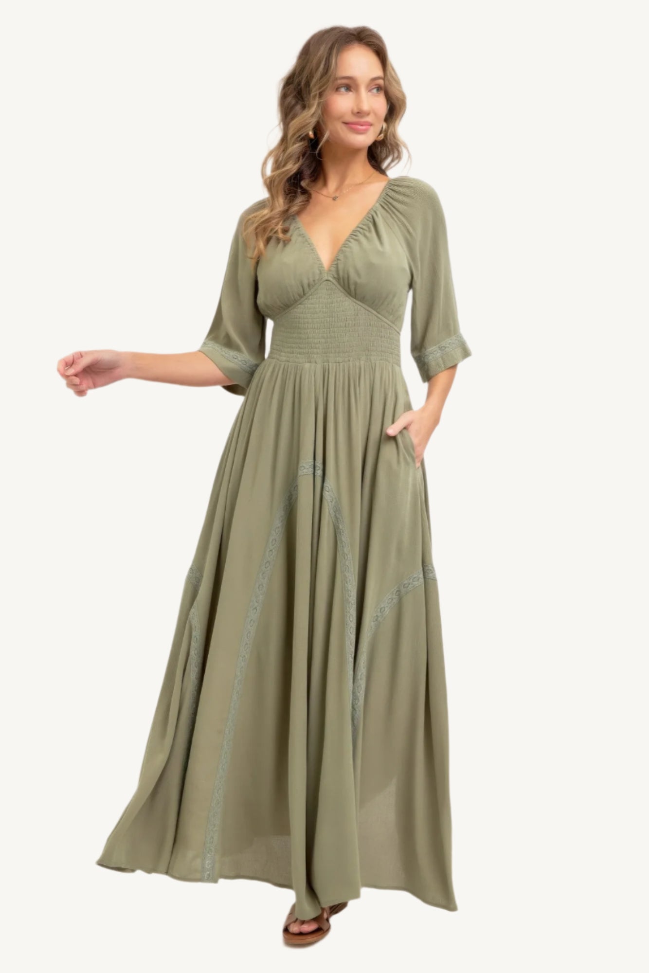 Romantic maxi dress made of lightweight rayon with a smocked bodice, V-neckline, lace-trimmed skirt, and breezy silhouette – feminine, flattering, and seasonless.