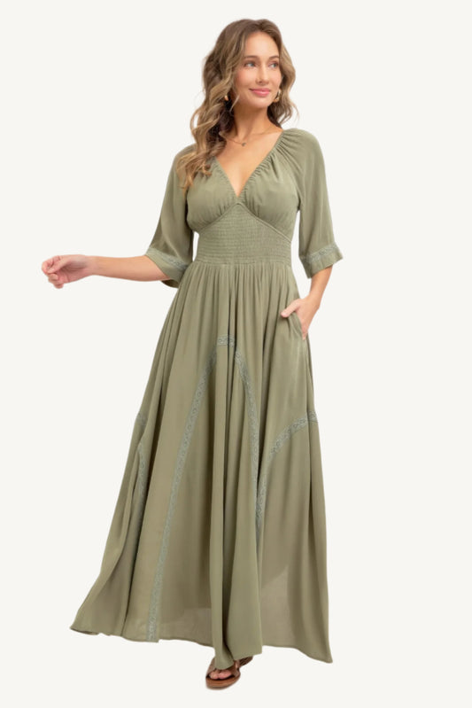 Romantic maxi dress made of lightweight rayon with a smocked bodice, V-neckline, lace-trimmed skirt, and breezy silhouette – feminine, flattering, and seasonless.