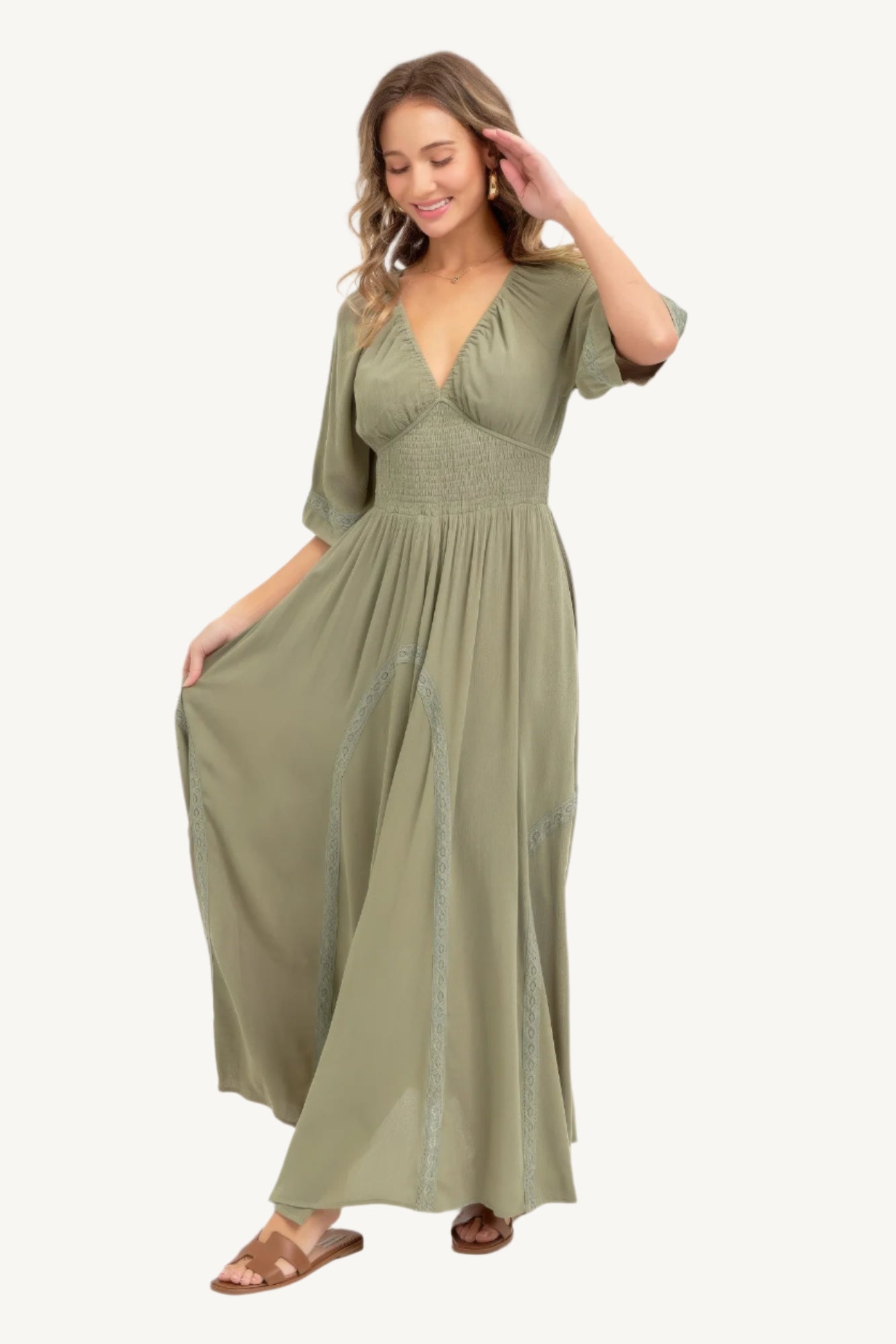 Romantic maxi dress made of lightweight rayon with a smocked bodice, V-neckline, lace-trimmed skirt, and breezy silhouette – feminine, flattering, and seasonless.
