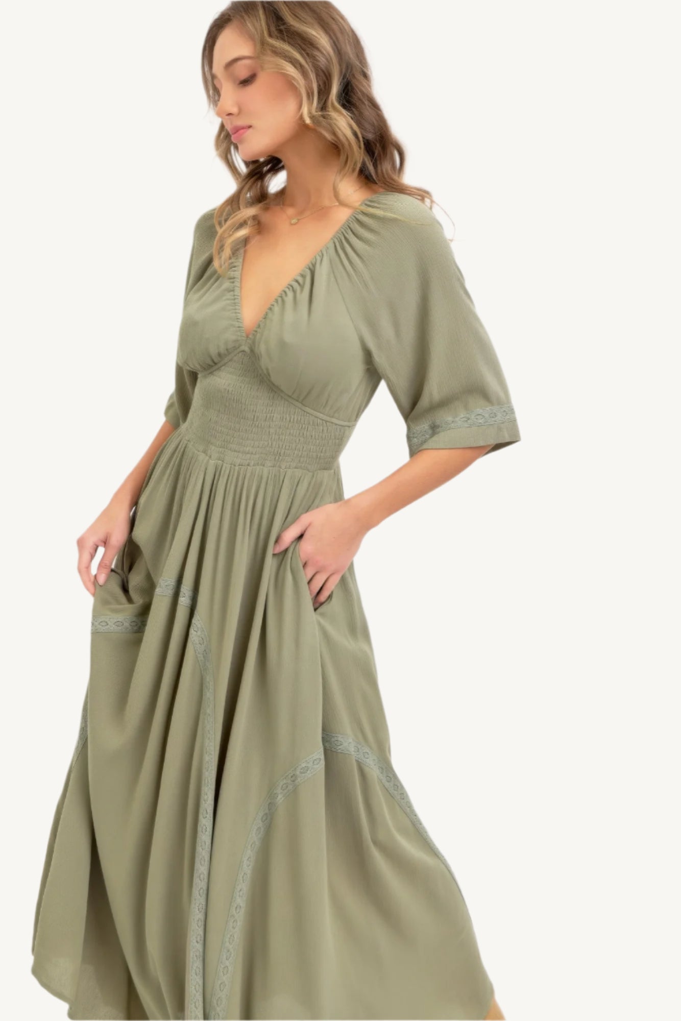 Romantic maxi dress made of lightweight rayon with a smocked bodice, V-neckline, lace-trimmed skirt, and breezy silhouette – feminine, flattering, and seasonless.