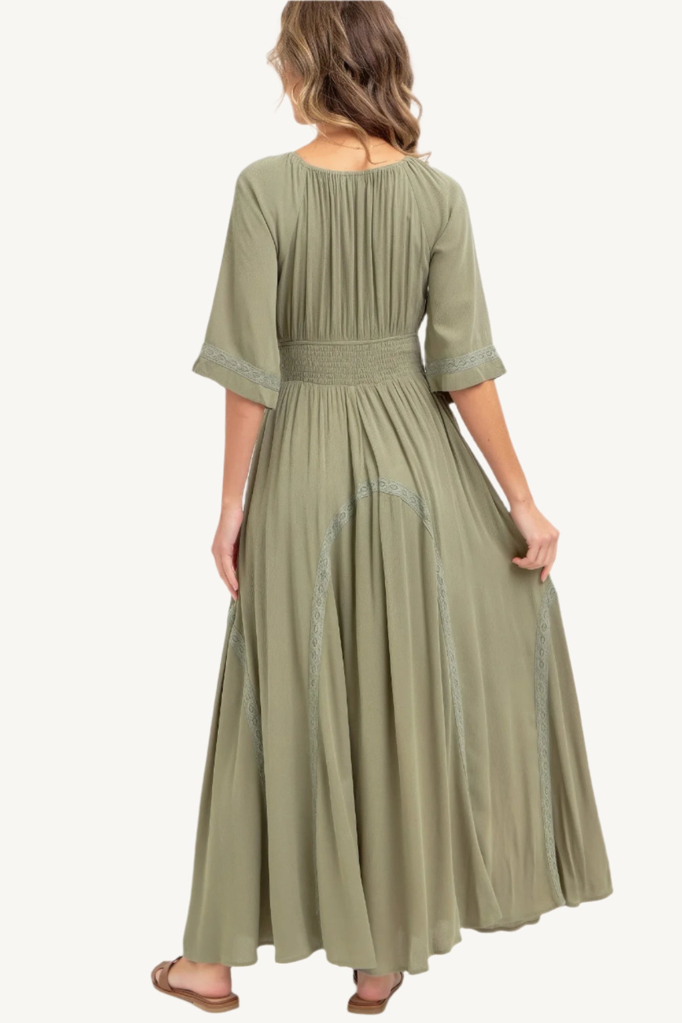 Romantic maxi dress made of lightweight rayon with a smocked bodice, V-neckline, lace-trimmed skirt, and breezy silhouette – feminine, flattering, and seasonless.