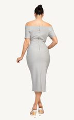 Off-shoulder bodycon dress with short sleeves, back zipper, and knee-length slit – made from soft stretch knit for a flattering, elegant fit.
