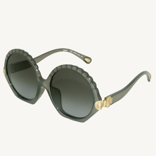 Elegant Chloé women's sunglasses model CE747SA-036 in dark gray with a modern, oversized frame.