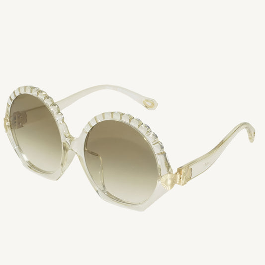 Chloé women's sunglasses model CE747SA-688 in champagne color with elegant, oversized design and luxury finish.