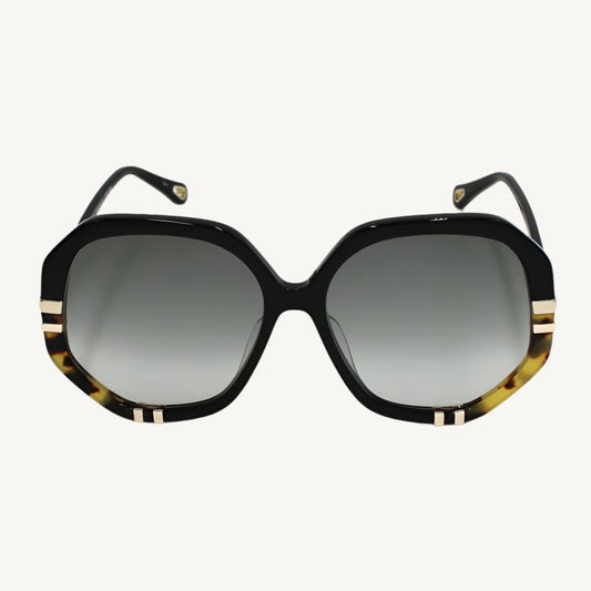 "Chloé women's sunglasses, model CH0105SA-002, in black Havana with elegant oversized frame and signature luxury touch"