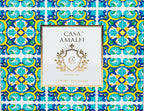 "Casa Amalfi Sailing Il Mediterraneo Gift Set featuring six luxurious 150g vegan soaps including a body scrub and a natural sisal bag, beautifully presented in an exclusive maiolica design inspired by the Amalfi Coast."