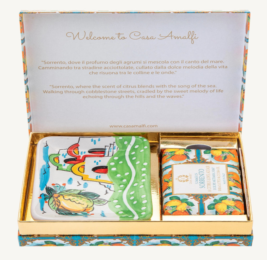 "Casa Amalfi Summer in Sorrento Gift Box featuring a 150g vegan orange, lemon & spices soap and a hand-painted ceramic soap dish from Vietri Sul Mare, inspired by the Amalfi Coast and presented in a glossy maiolica design."