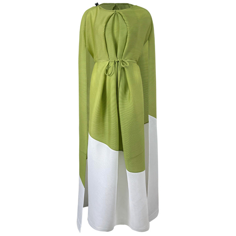 Green and white dress with long sleeves on a white background