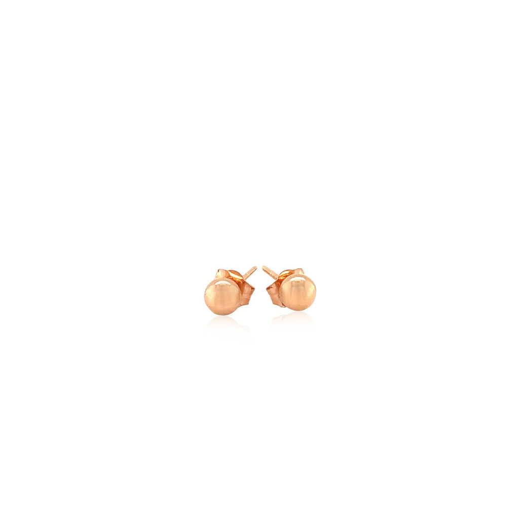 "14k rose gold stud earrings with shiny, globe-like design"
