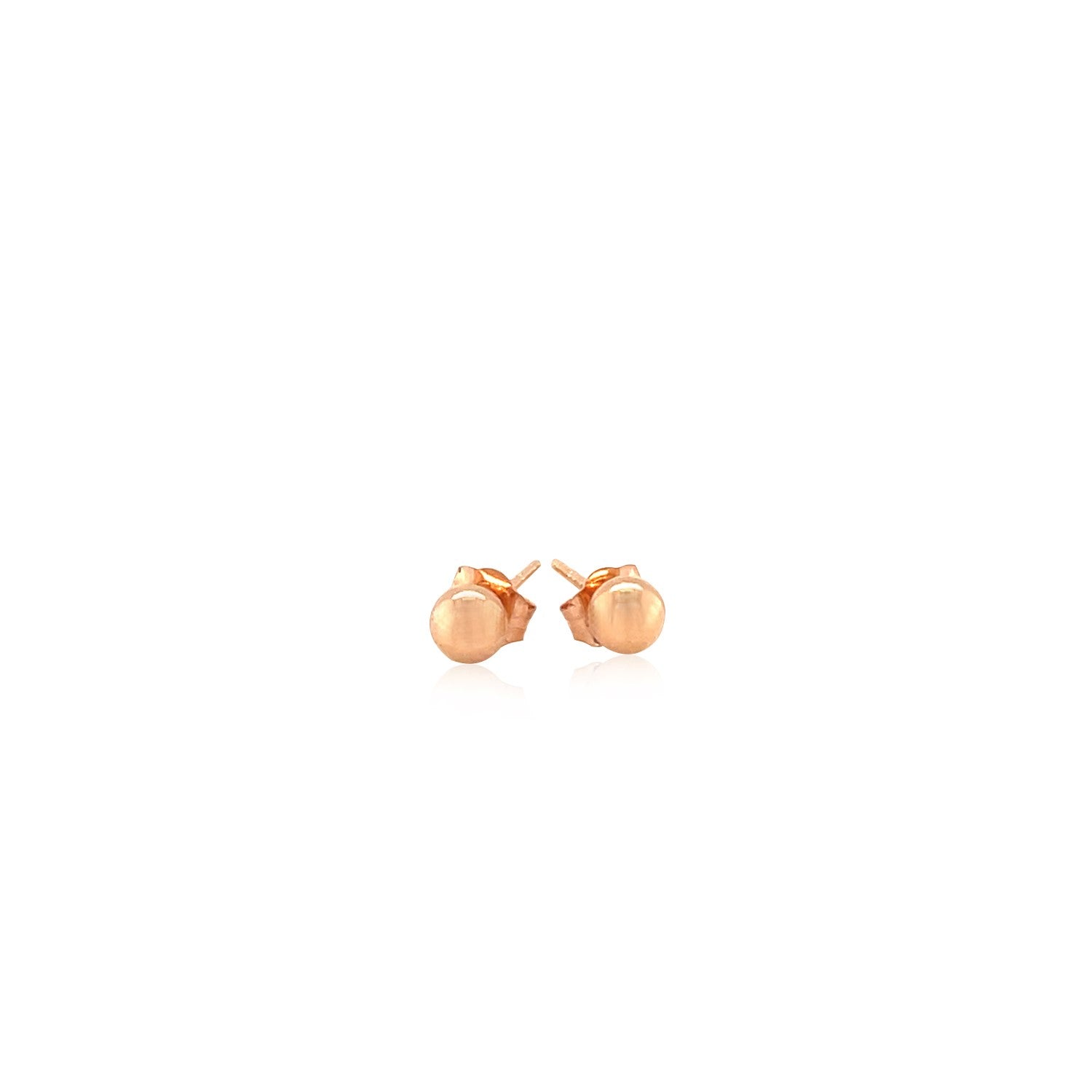 "14k rose gold stud earrings with shiny, globe-like design"