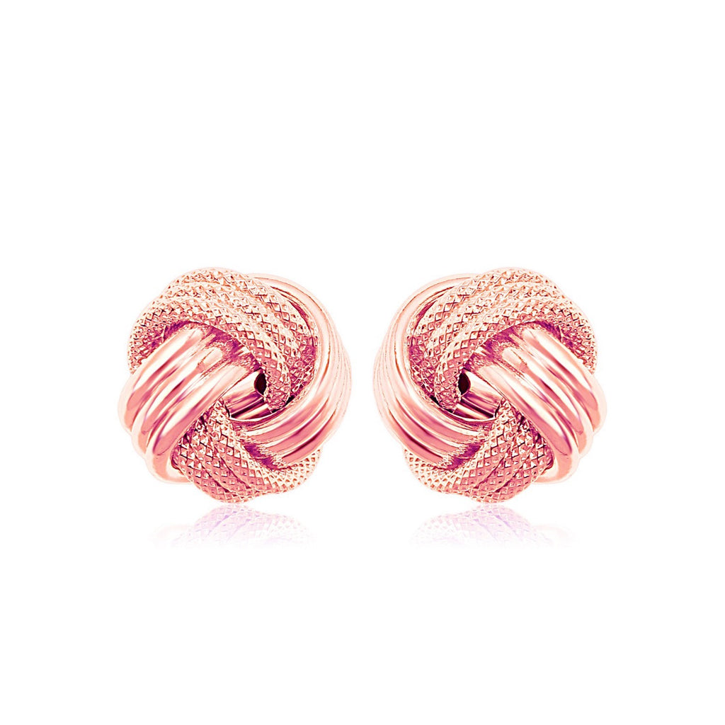 "14k rose gold love knot earrings with high polish ridge motif and ornate textured design"