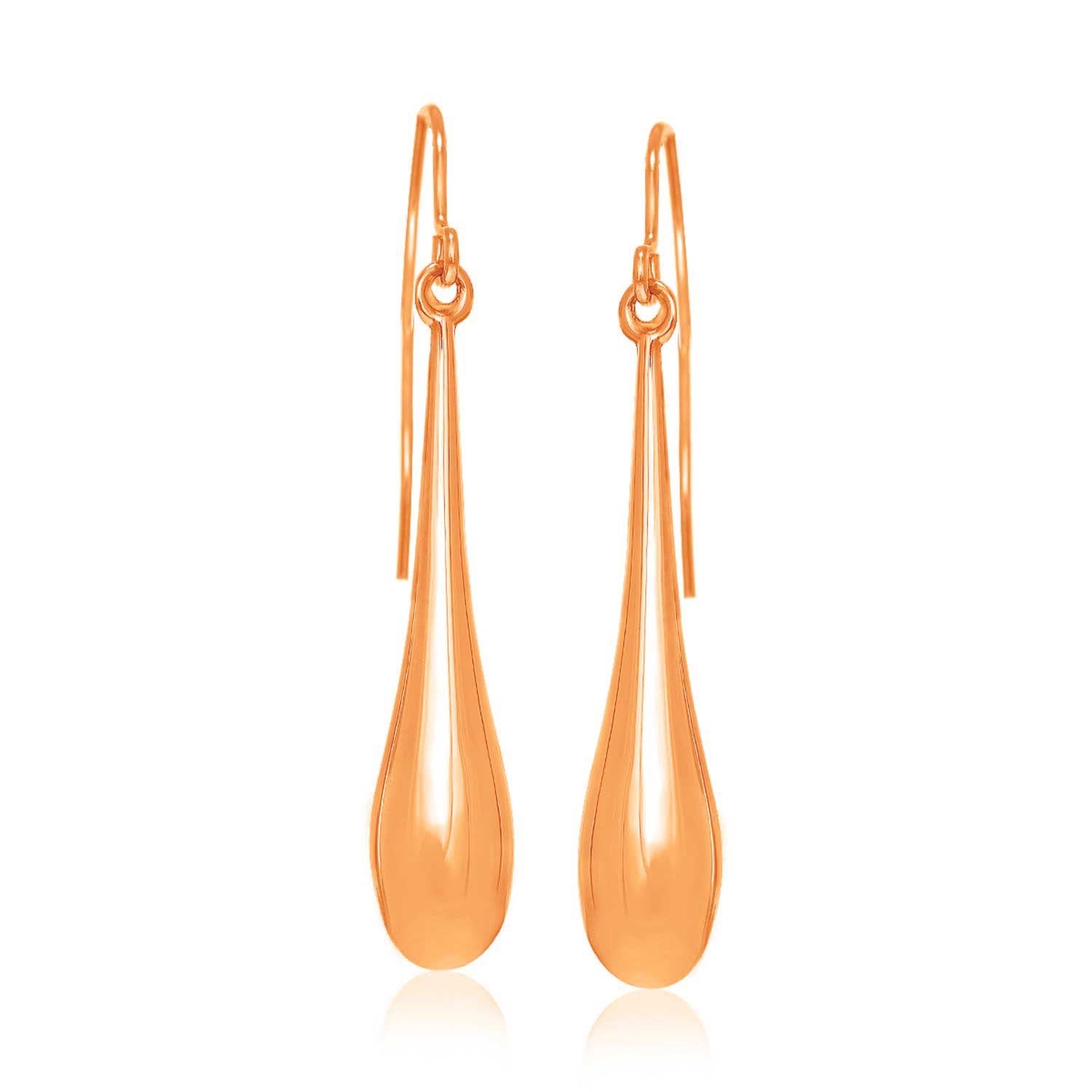 Minimalist 14k rose gold earrings with elongated puffed teardrop design and French wire backings.