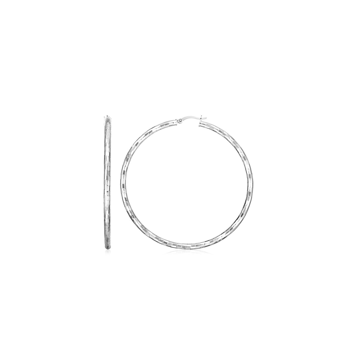 Bold hammered sterling silver hoop earrings with polished finish, measuring 20x3mm and secured with hinge clasps.