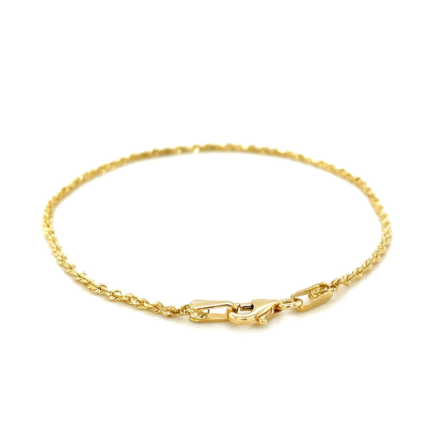 10k yellow gold solid rope bracelet with diamond-cut finish, 1.5mm wide, elegant and durable design.