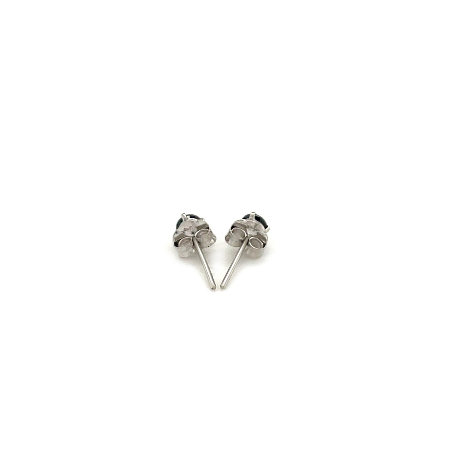 "14k white gold stud earrings with black cubic zirconia, minimalist and elegant design."