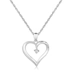 "Sterling silver heart pendant with diamond accents near the upper inner point, featuring a romantic and elegant design"