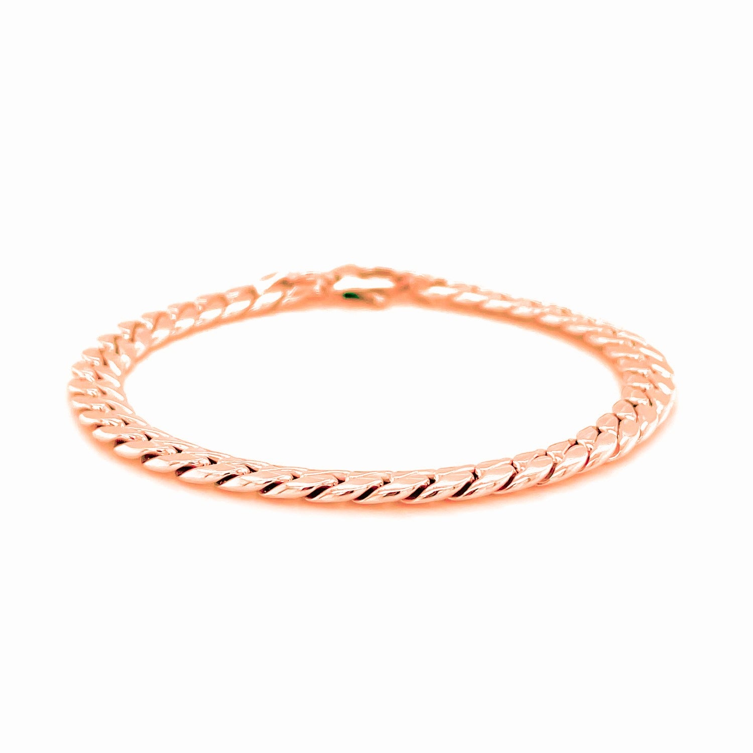 "Elegant 14K rose gold Cuban chain bracelet with polished links and lobster clasp, 7.25 inches long"
