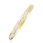 "Elegant 10k yellow and white gold two-tone bangle with polished zigzag sections and textured details, 7 inches"
