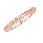 "Elegant 14k rose gold trilogy diamond bangle with high polish finish, designed for everyday wear."
