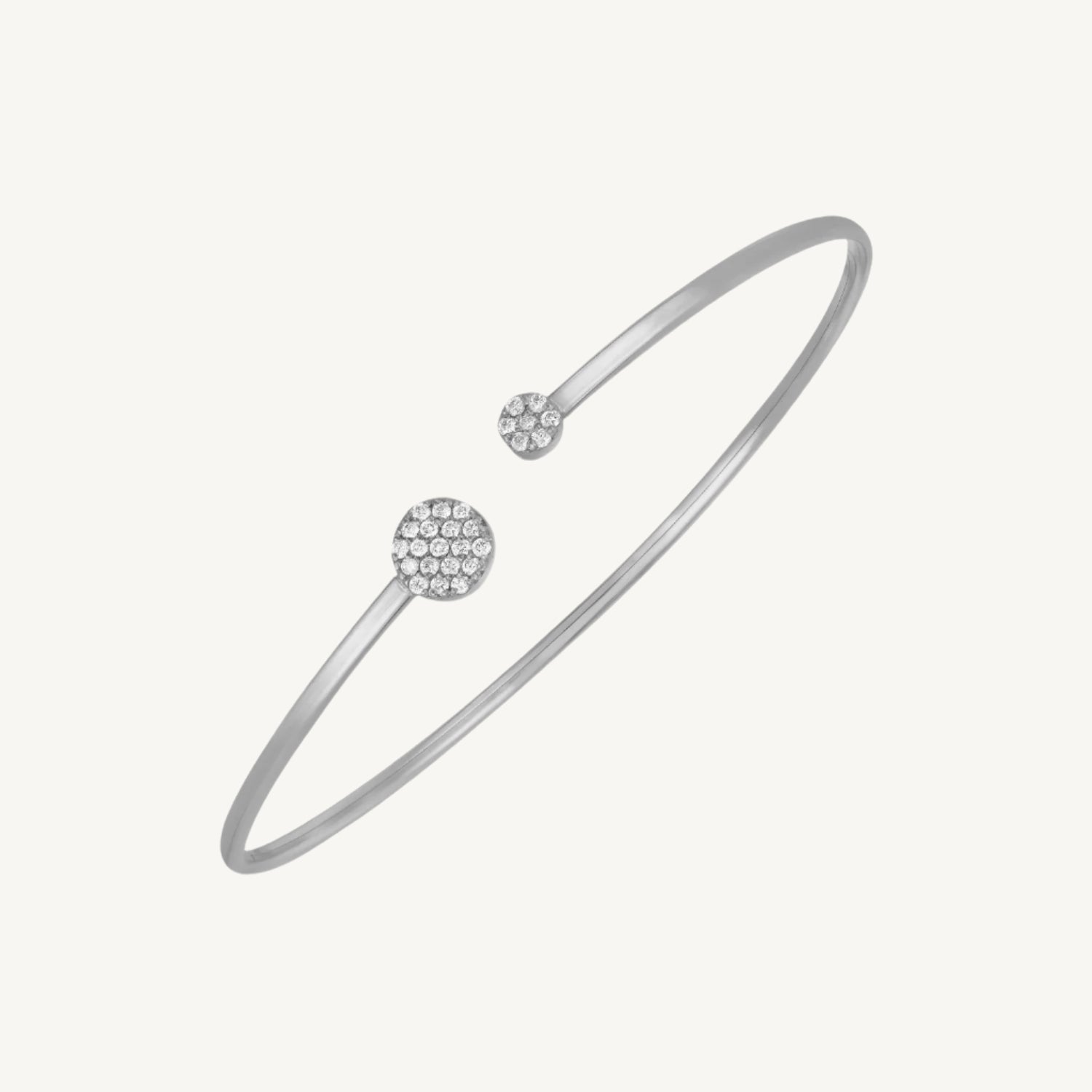 14k white gold Diamond Cluster bangle with pavé-set diamonds on two round discs, high polish finish.