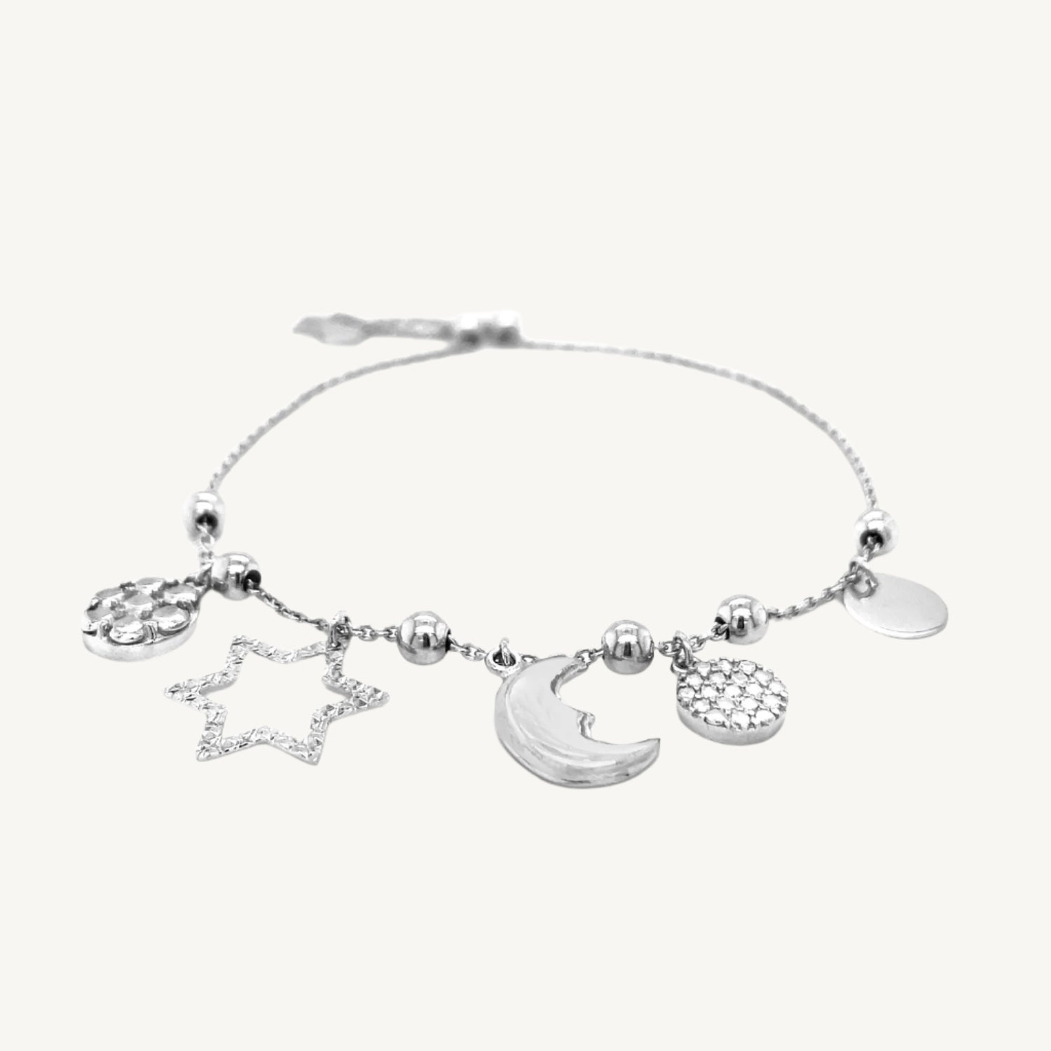 "Adjustable Sterling Silver Bracelet with Cubic Zirconia, celestial charms, and shiny silver beads, finished with a drawstring clasp"