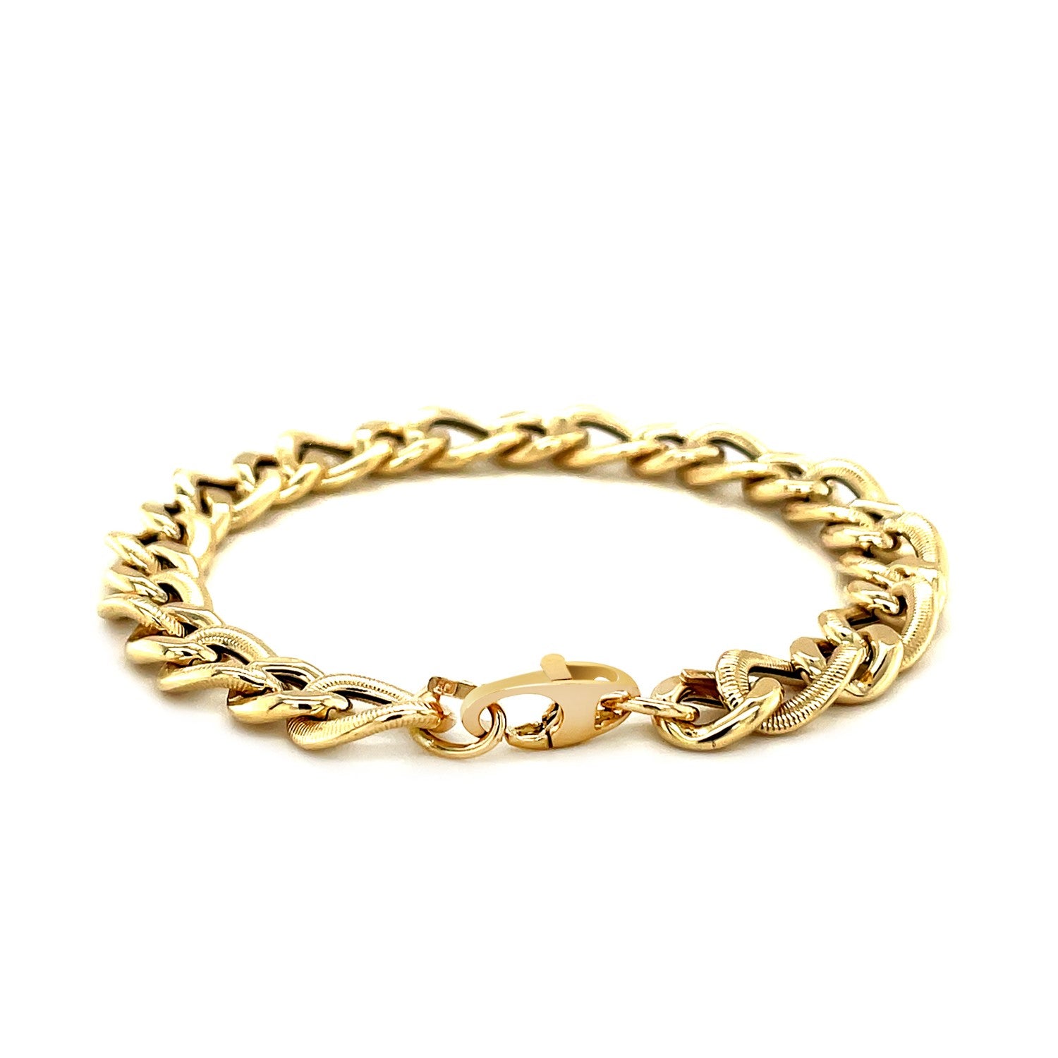 14k yellow tone gold curb chain bracelet with intricate diamond cuts, 7.25 inches long, secured with a fleur de lis lobster lock.
