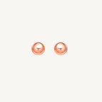 14k rose tone gold stud earrings with a classic spherical design and shiny polished finish.